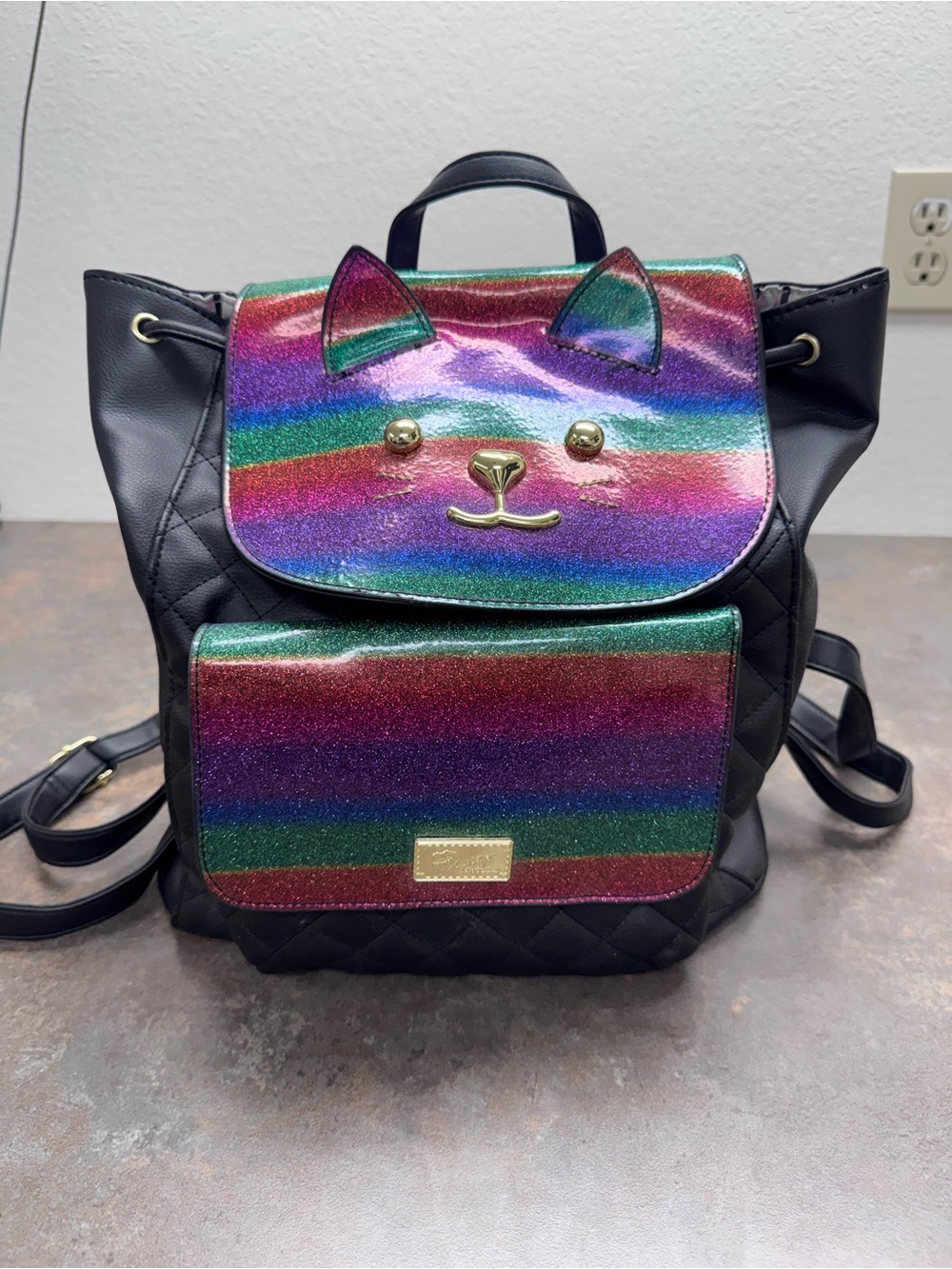 Betsey Johnson Black Quilted Backpack with Rainbow Cat Flap
